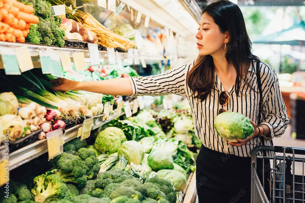 elegant female grocery shopping