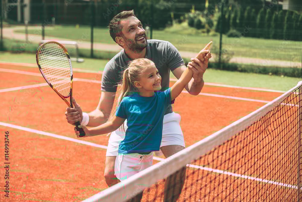 Tennis is fun when father is near.